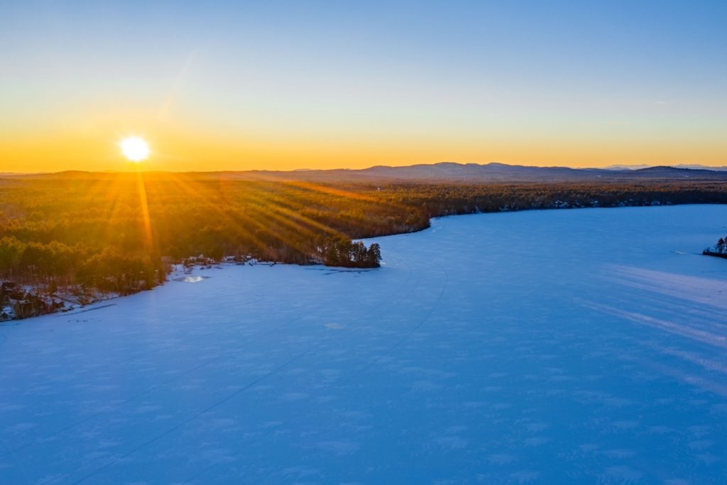 Watchic Lake Aerial West with Setting Sun Watchic Lake Association
